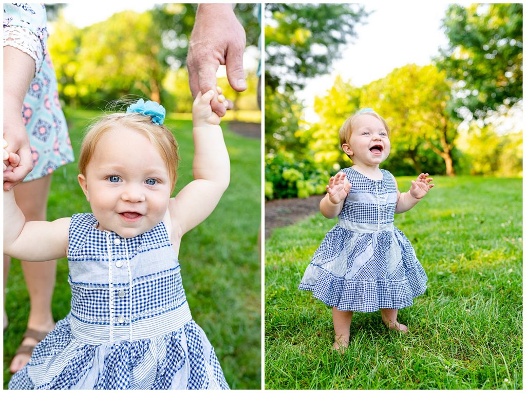 little girl in blue dress laughing and smiling